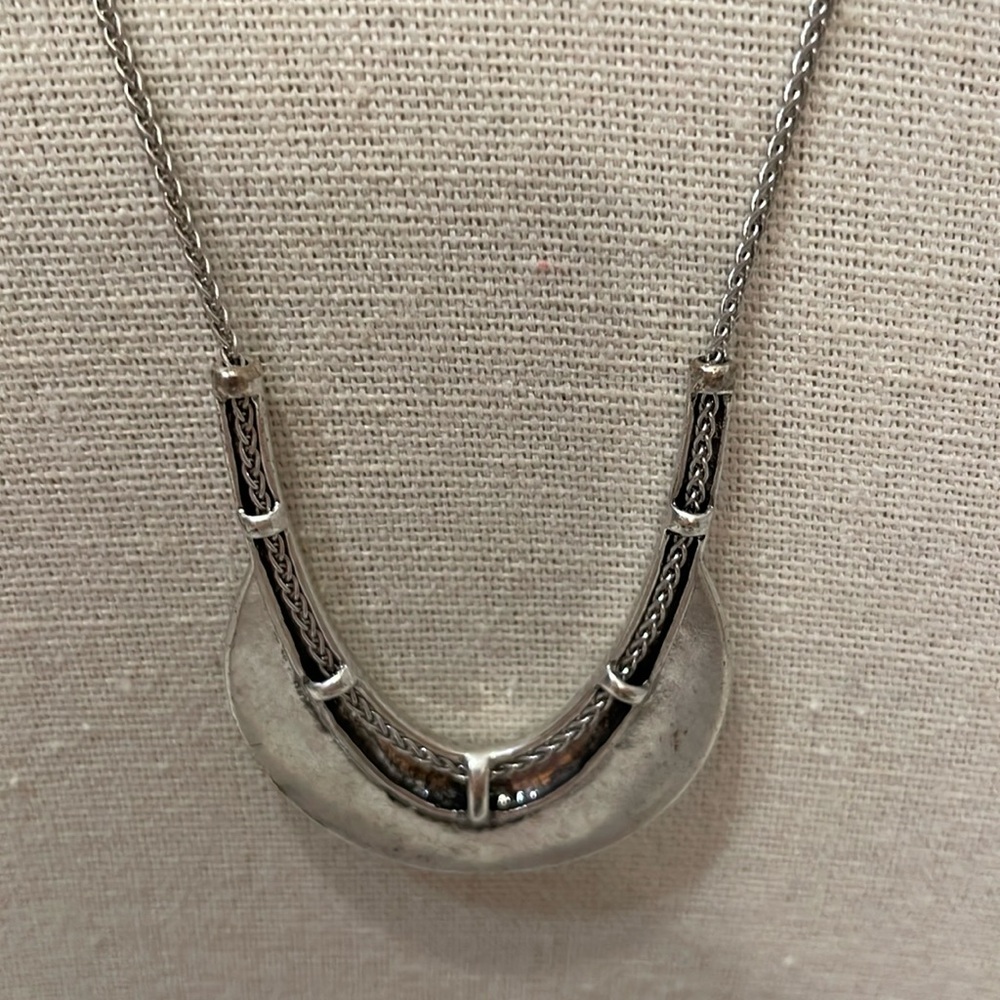Lucky adjustable to any length silver necklace and pendant.